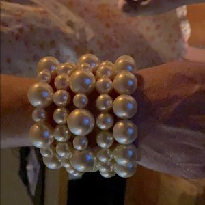 5 costume jewelry pearl bracelets.